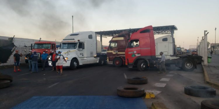 Dirigente de dueños de camiones afirma que no paralizarán a 24 horas del cambio de mando, como amenaza un mensaje de voz