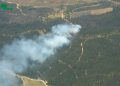 Decretan Alerta Roja por incendio forestal que amenaza reserva Lago Peñuelas