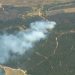 Decretan Alerta Roja por incendio forestal que amenaza reserva Lago Peñuelas