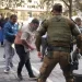 Presidente de la CUT denuncia agresiones de carabineros durante intento de entrega de manifiesto en La Moneda